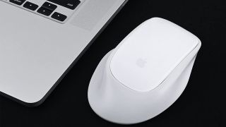 Apple's Magic Mouse 2 in the MouseBase cradle.