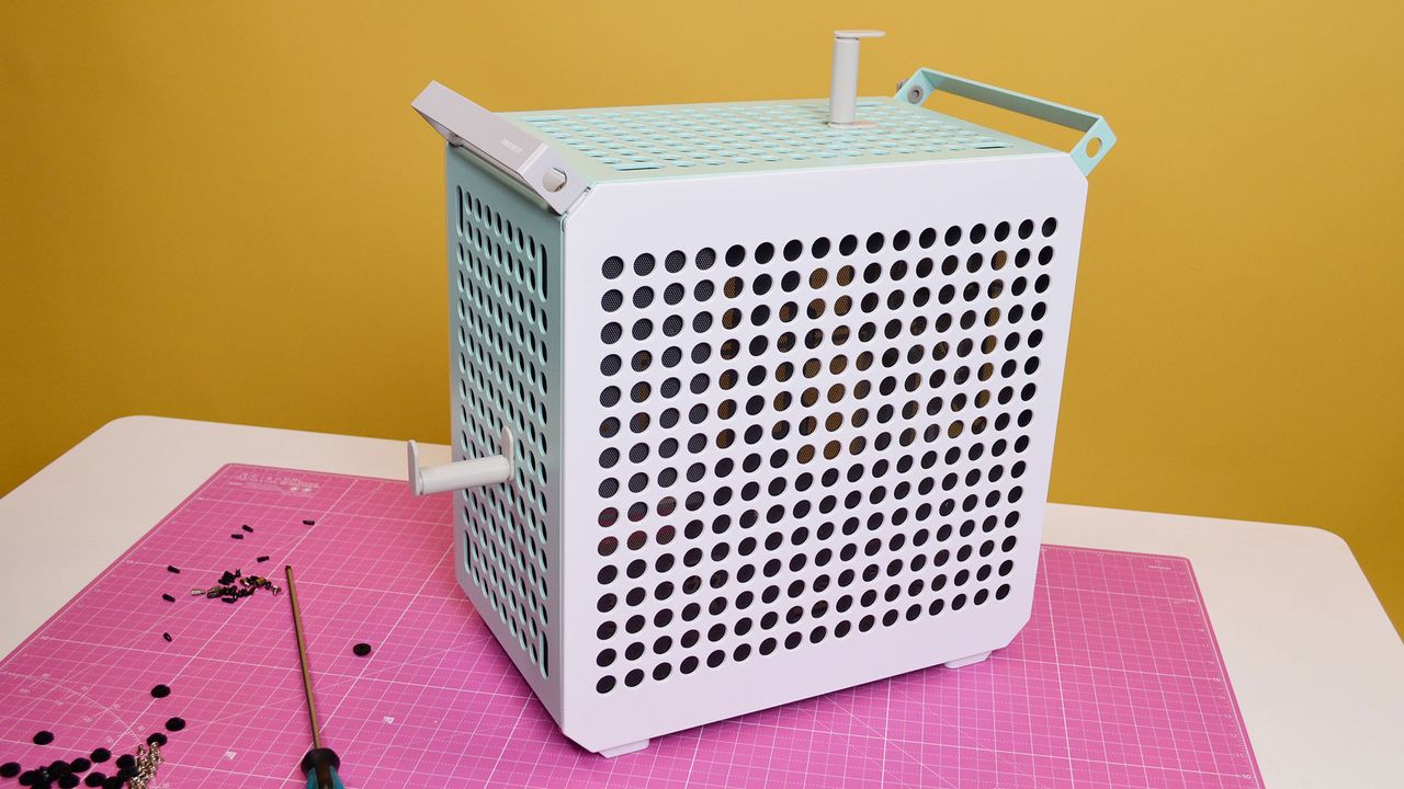 A Cooler Master Qube 500 PC case on a desk