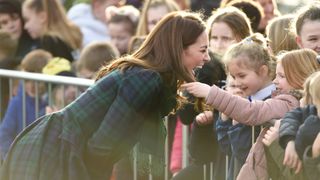 Kate Middleton laughing with young fans