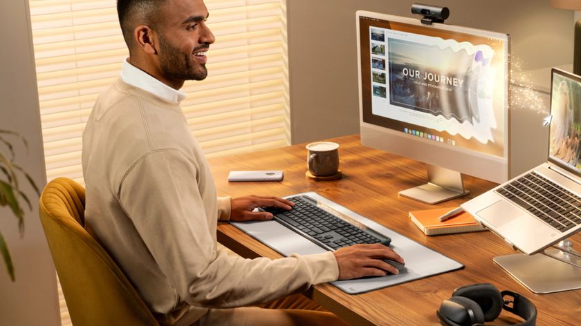 Logitech Signature Slim Solar+ K980 being used by a person at a desk