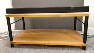 Klipsch Flexus Core 200 soundbar on wooden AV rack