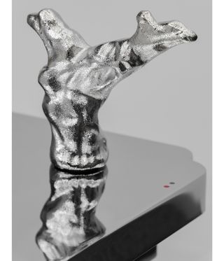 Sculptural tap by William Lim in chrome