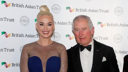 LONDON, UNITED KINGDOM - FEBRUARY 04: Prince Charles, Prince of Wales, Royal Founding Patron of the British Asian Trust, and his wife Camilla, Duchess of Cornwall, meet musician American Katy Perry (L) and Indian businesswoman Natasha Poonawalla as they arrive to attend a reception for supporters of the British Asian Trust on February 4, 2020 in London, England. (Photo by Kirsty Wigglesworth - WPA Pool/ Getty Images)