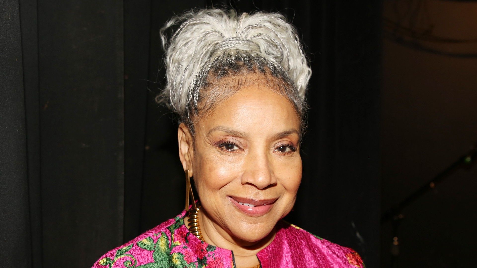 Phylicia Rashad wearing a grey braided updo at the Governors Awards