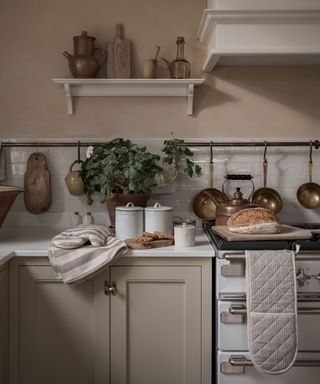Small modern farmhouse kitchen with wooden and linen decorative details
