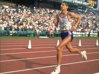 Richard Nerurkar running on a track at the 1990 Atlanta Olympics