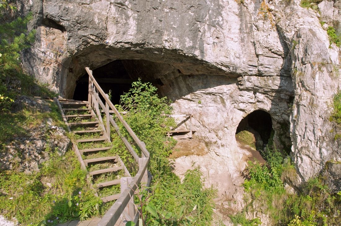 the entrance to the Denisova Cave in southern Siberia