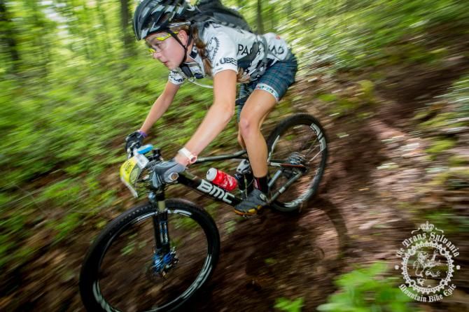 Emily Shields descends the newly reopened trail of the first enduro segment of Stage 6