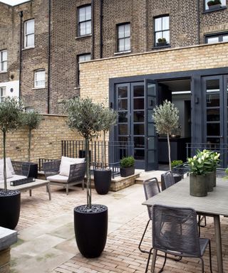 outdoor living space with black patio doors
