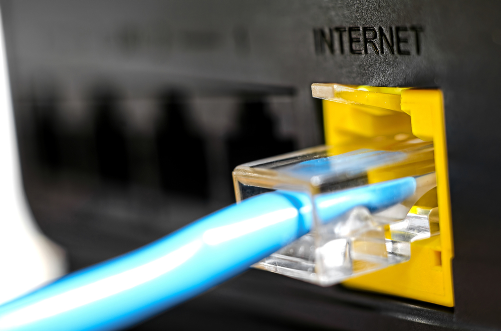 An Ethernet cable plugged into a router