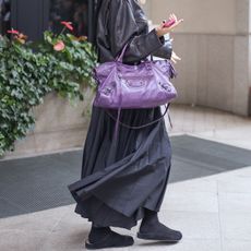 Amelia Gray wearing clogs. 