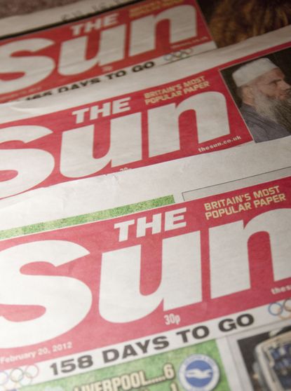 Copies of the Sun newspaper