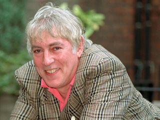 A posed shot of Peter Cook.