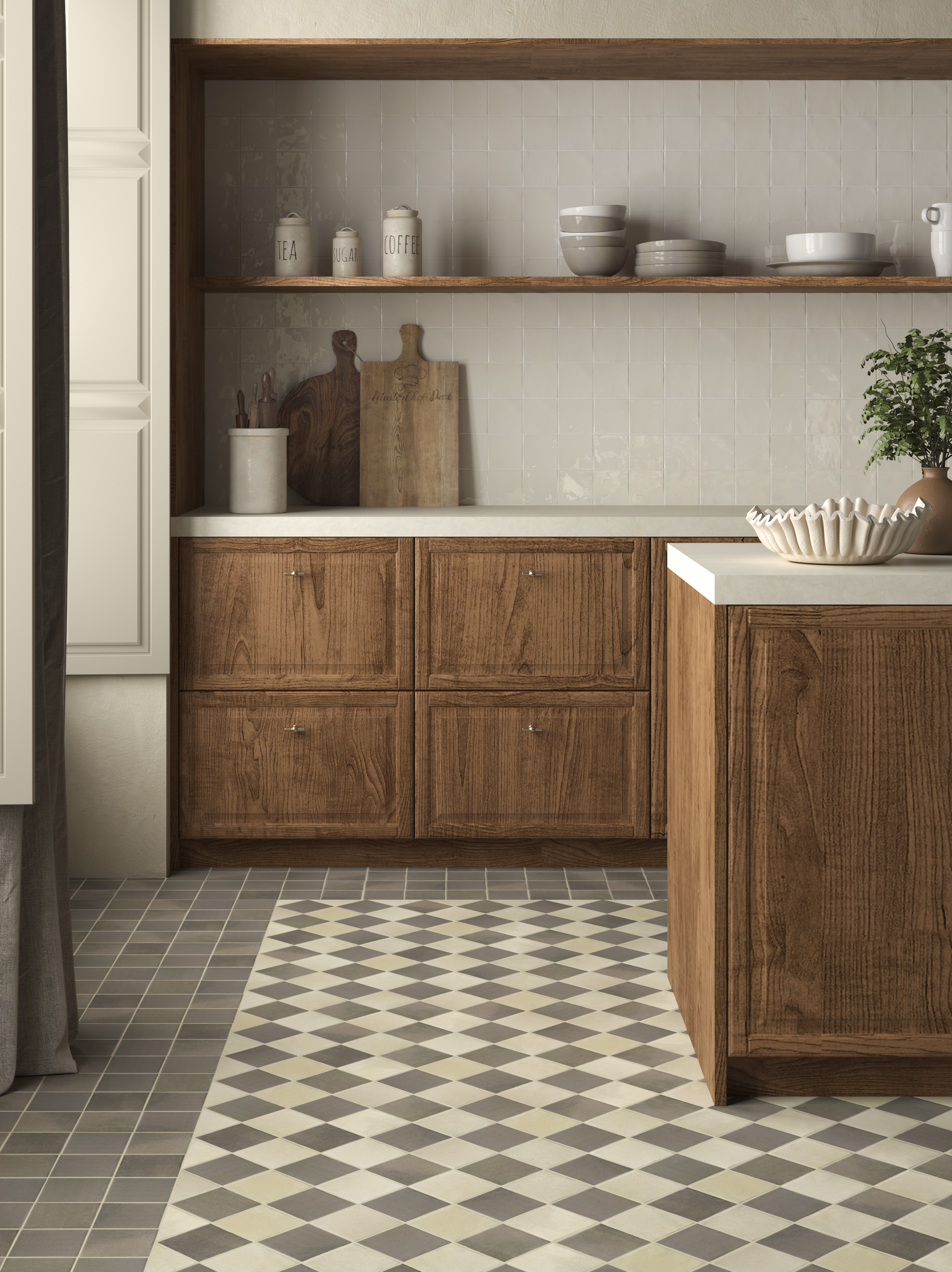 A kitchen with painted, ceramic floor tiles and oak brown cabinets