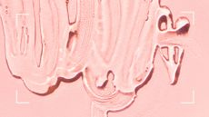 Image of lube on light pink paper background to illustrate what is lube and how to use it