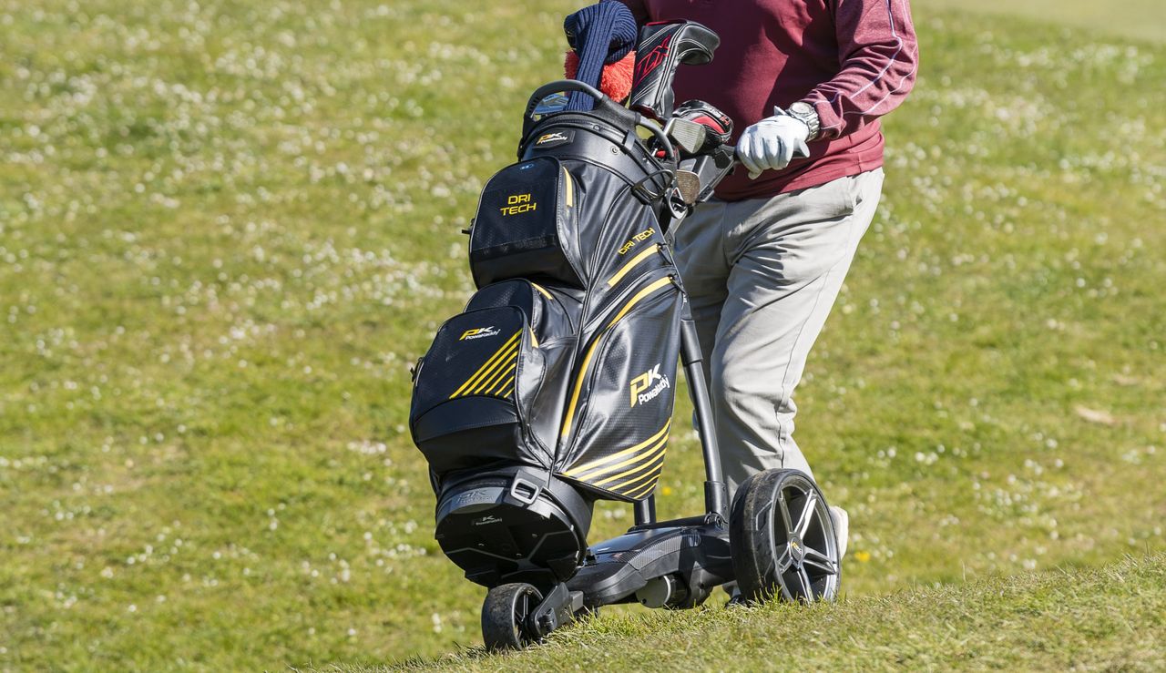 The PowaKaddy Dri Tech Cart Bag on a trolley