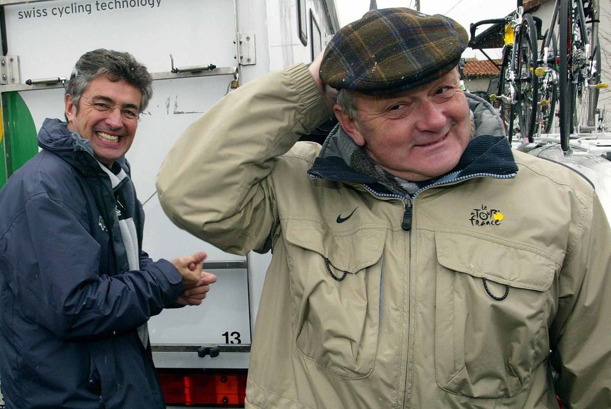 Marc Madiot and Jean-Marie Leblanc share a light-hearted moment at Paris-Nice 2004.