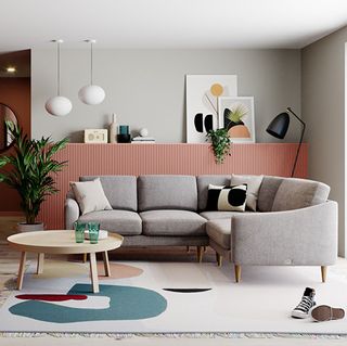 living room with grey sofa and carpet floor