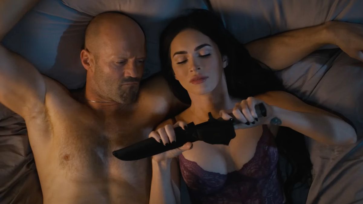 Megan Fox and Jason Statham in bed in Expend4bles (2023)