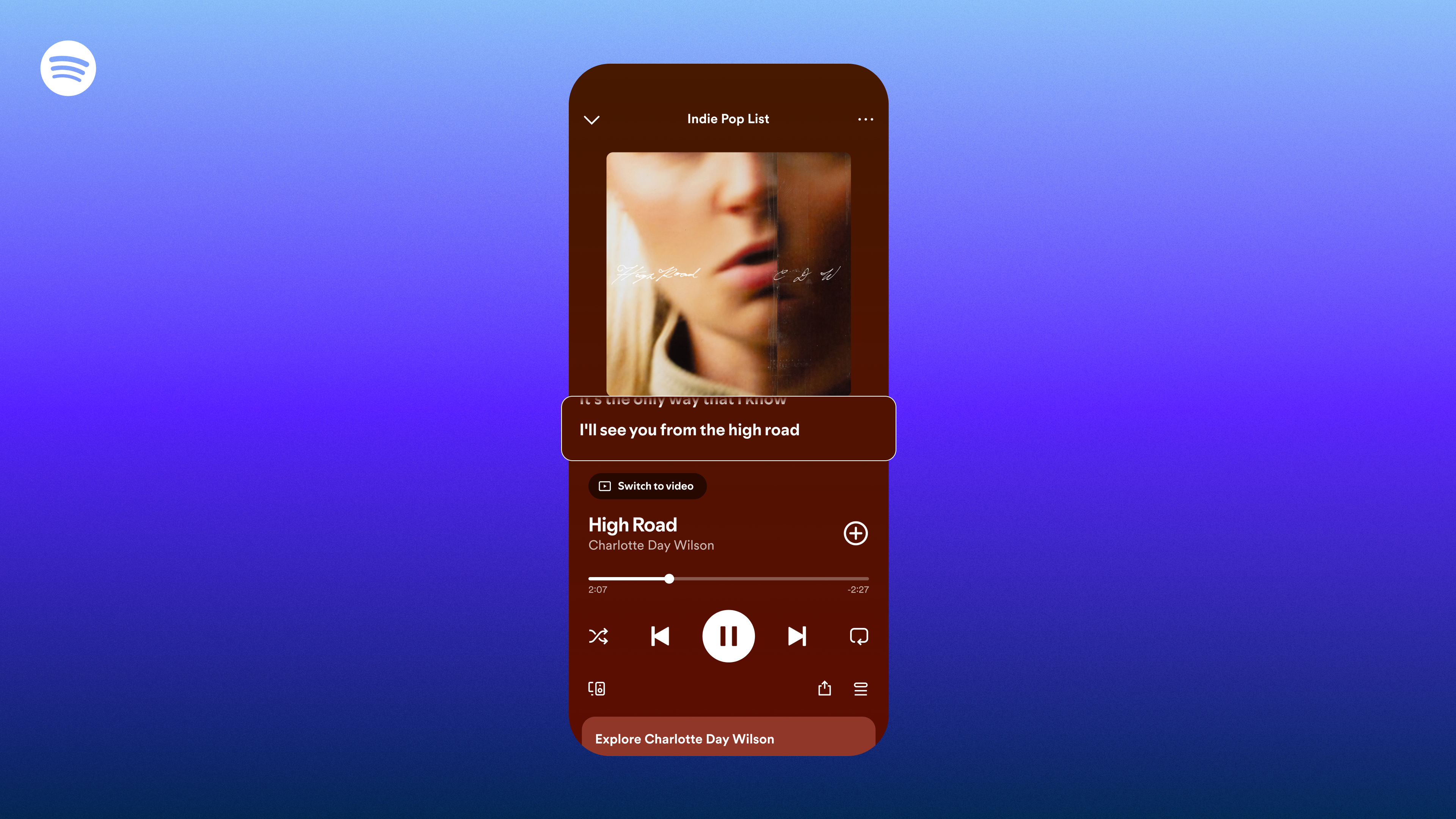 A smartphone showing the new lyrics tab in the Spotify playback page