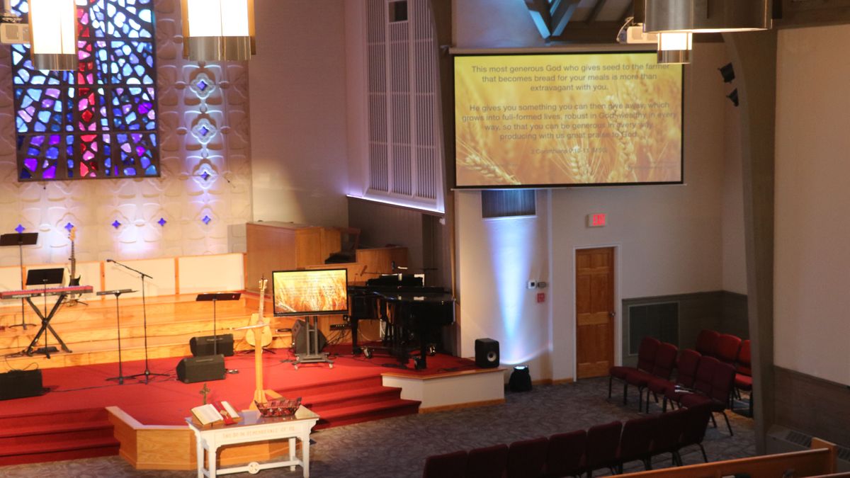 ChurchPix at work on a lit up altar with digital display in a local Arlington, VA, church.