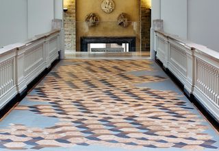 A graphic cork installation by FAT architecture for cork producer Amorim lines one of the V&A's walkways.