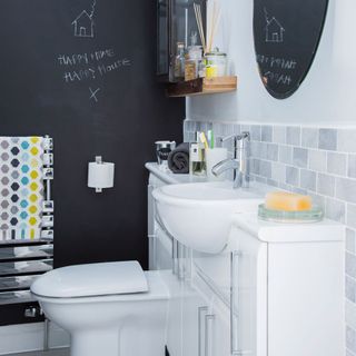 cloakroom with blackboard with commode