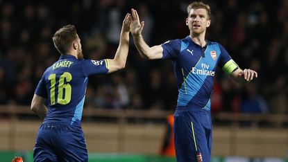 Arsenal's Welsh midfielder Aaron Ramsey celebrates 
