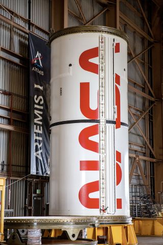 NASA’s formerly-retired "worm" logotype has been painted onto the Artemis I mission's Space Launch System (SLS) twin solid rocket boosters inside the Rotation, Processing and Surge Facility at NASA's Kennedy Space Center in Florida.