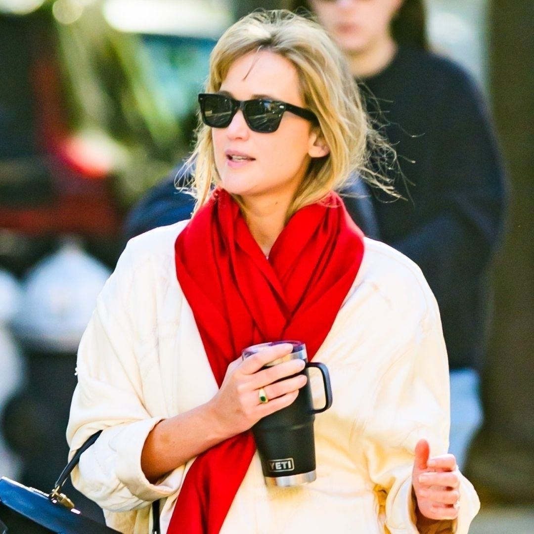 Jennifer Lawrence Pulls Off a Caped T-Shirt and Trousers at a Film ...