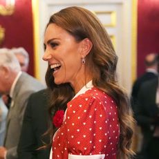 Kate Middleton wears a red dress
