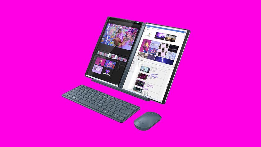 Product shot of Lenovo Yoga Book 9i on a magenta background