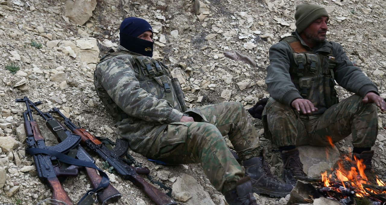 Turkish-backed fighters north of the Syrian town of Azaz near the border