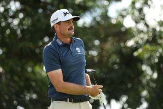 Keegan Bradley watches a shot after hitting a fairway wood