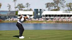 Jon Rahm at the top of his backswing on the 17th at TPC Sawgrass