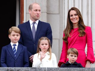 The Prince and Princess of Wales stand with Prince George, Princess Charlotte and Prince Louis on the balcony of Buckingham Palace following the Platinum Pageant