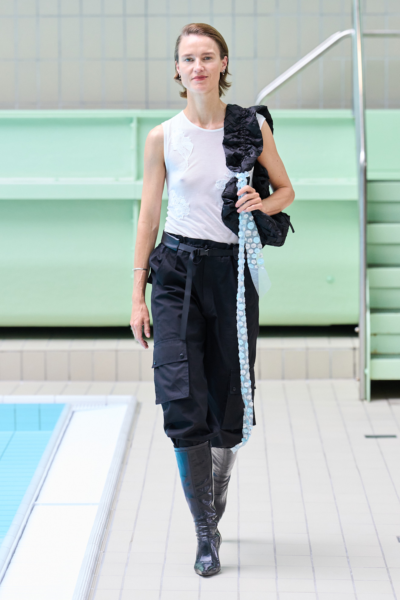 Opérasport model wearing riding boots.