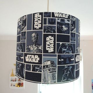 bedroom with star war lampshade