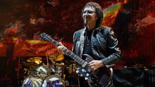 Black Sabbath’s Tony Iommi performing onstage in 2016