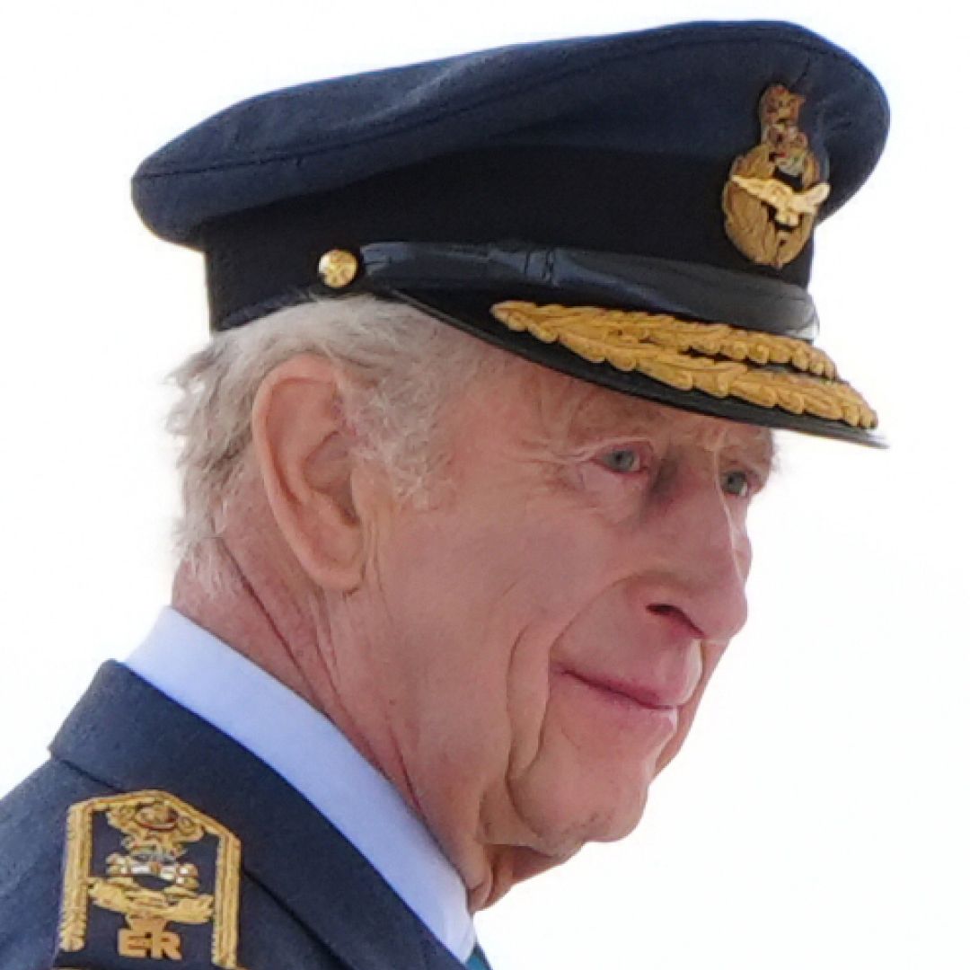 King Charles wearing a blue military uniform