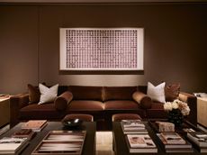 interiors of home in 100 George Street, warm, brown tones and fabrics