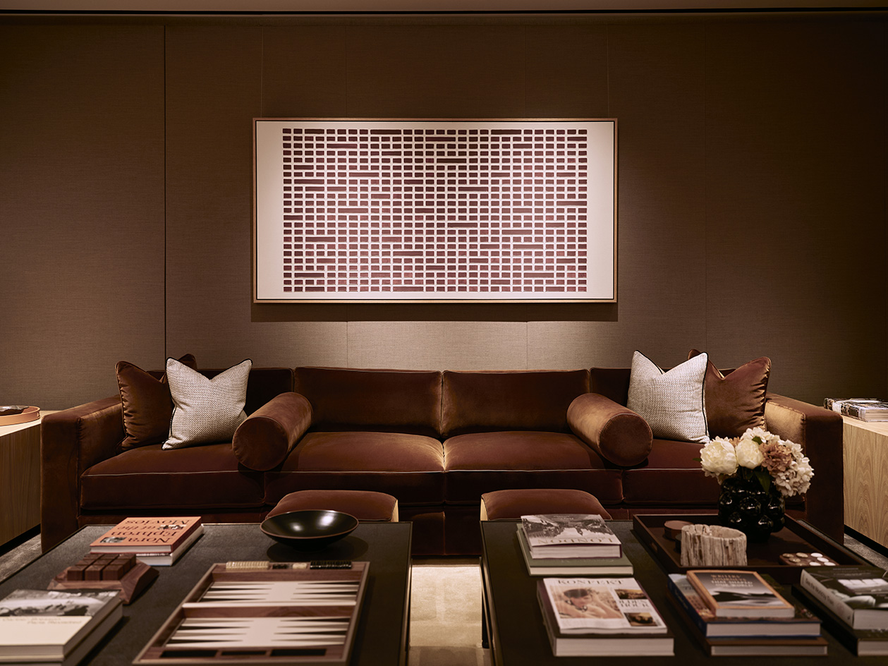 interiors of home in 100 George Street, warm, brown tones and fabrics