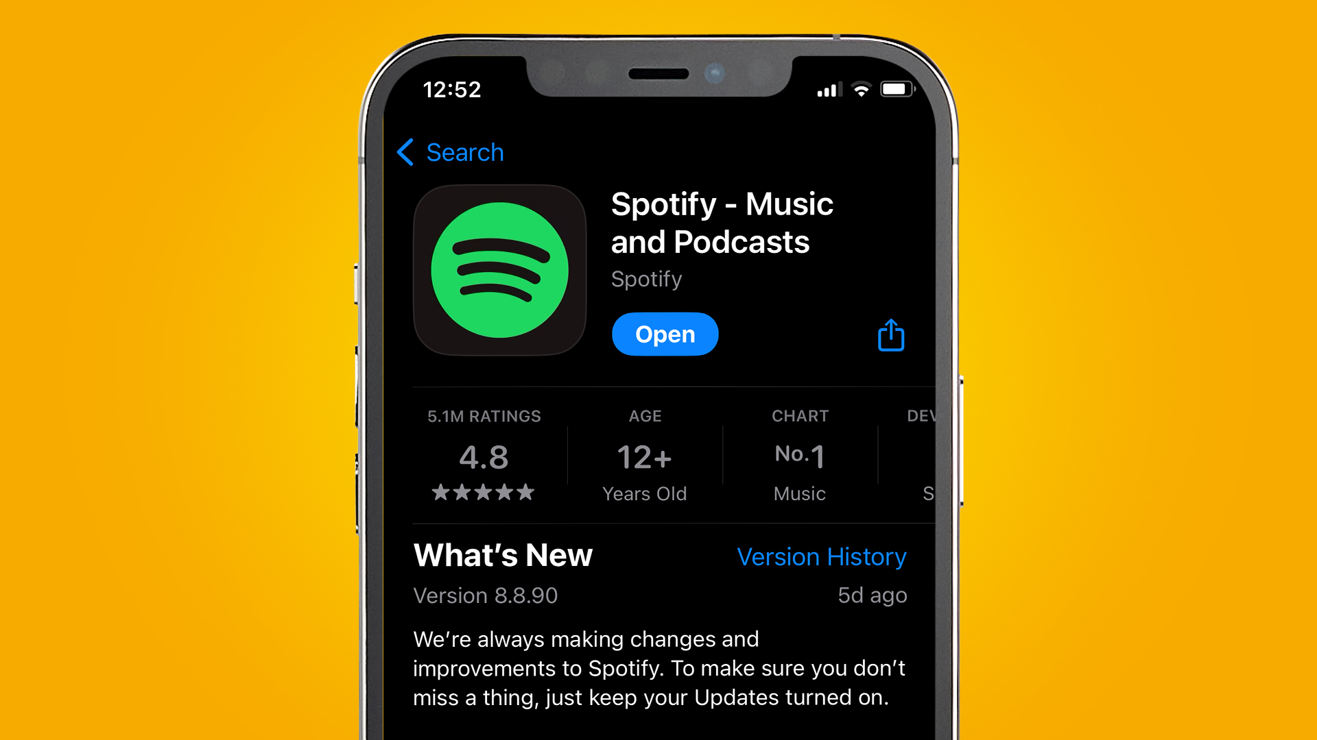 An iPhone on an orange background showing the Spotify app in the App Store