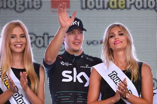 Stage winner Danny van Poppel waves from the podium