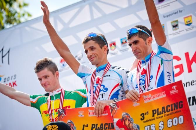 The podium for stage winners, second place for Oscar Pujol Munoz (Polygon Sweet Nice ), the winner Hossein Askari (Tabriz Petrochemical Cycling Team) and third place for Alireza Asgharzadeh (Tabriz Petrochemical Cycling Team)