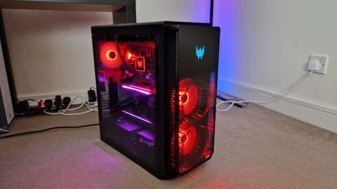 Acer Predator Orion 7000 with its red RGB fans coloured red, and the GPU lit up in pink