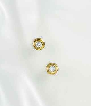 diamond and gold earrings by Jessica McCormack and the Haas Brothers