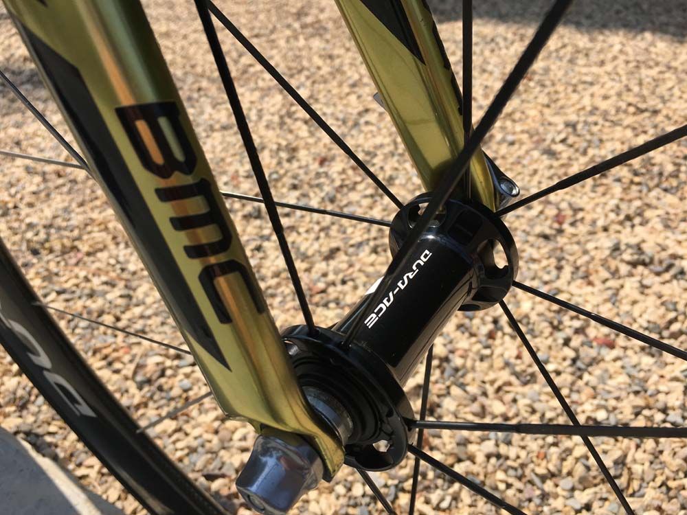 The Shimano Dura-Ace front hub and BMC fork