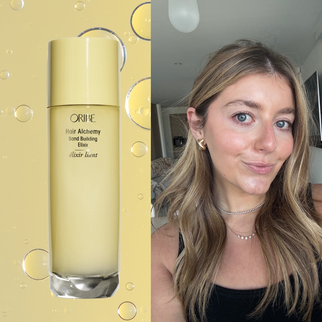 samantha holender taking a selfie on a yellow background next to a bottle of oribe hair alchemy elixir
