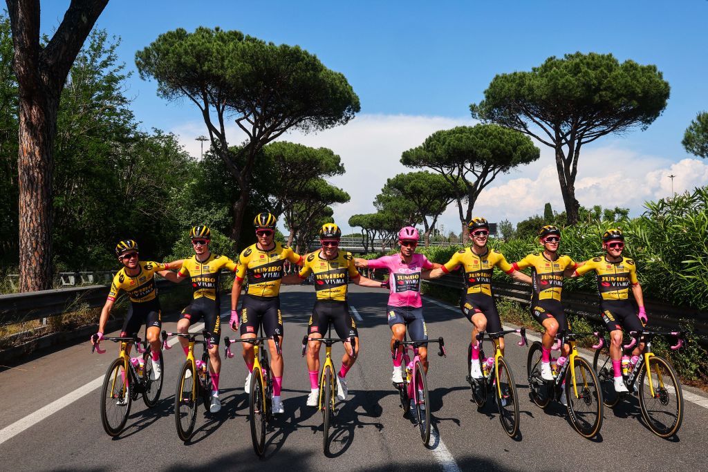 Overall leader JumboVismas Slovenian rider Primoz Roglic C poses with his teammates during the twentyfirst and last stage of the Giro dItalia 2023 cycling race 135 km in and around Rome on May 28 2023 Photo by Luca Bettini AFP Photo by LUCA BETTINIAFP via Getty Images